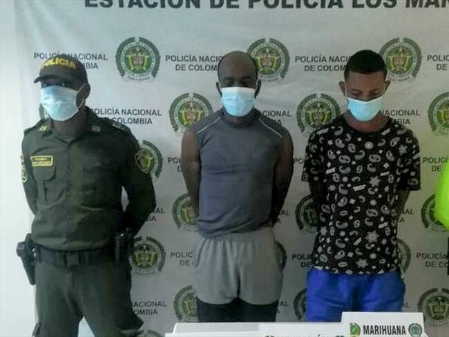 Los capturados fueron dejados a disposición de la Fiscalía 145 seccional URI Cali por tráfico de estupefacientes y porte ilegal de armas de fuego. Foto: Policía Nacional